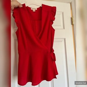 Red, low cut cross body blouse